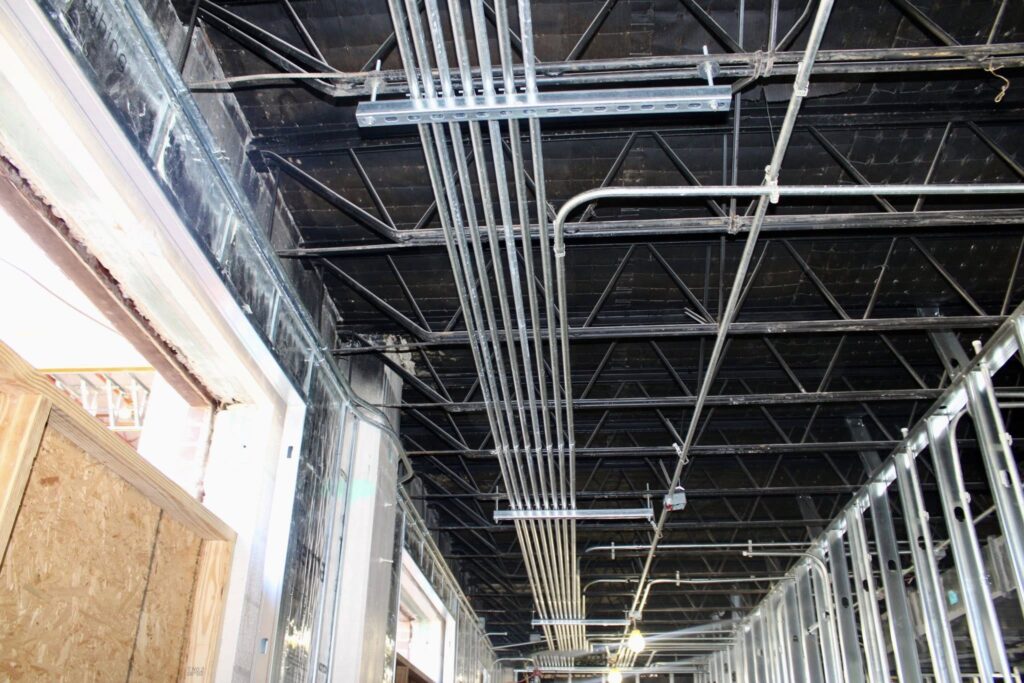 Overhead electrical conduit and ceiling rough-in by GT Electric